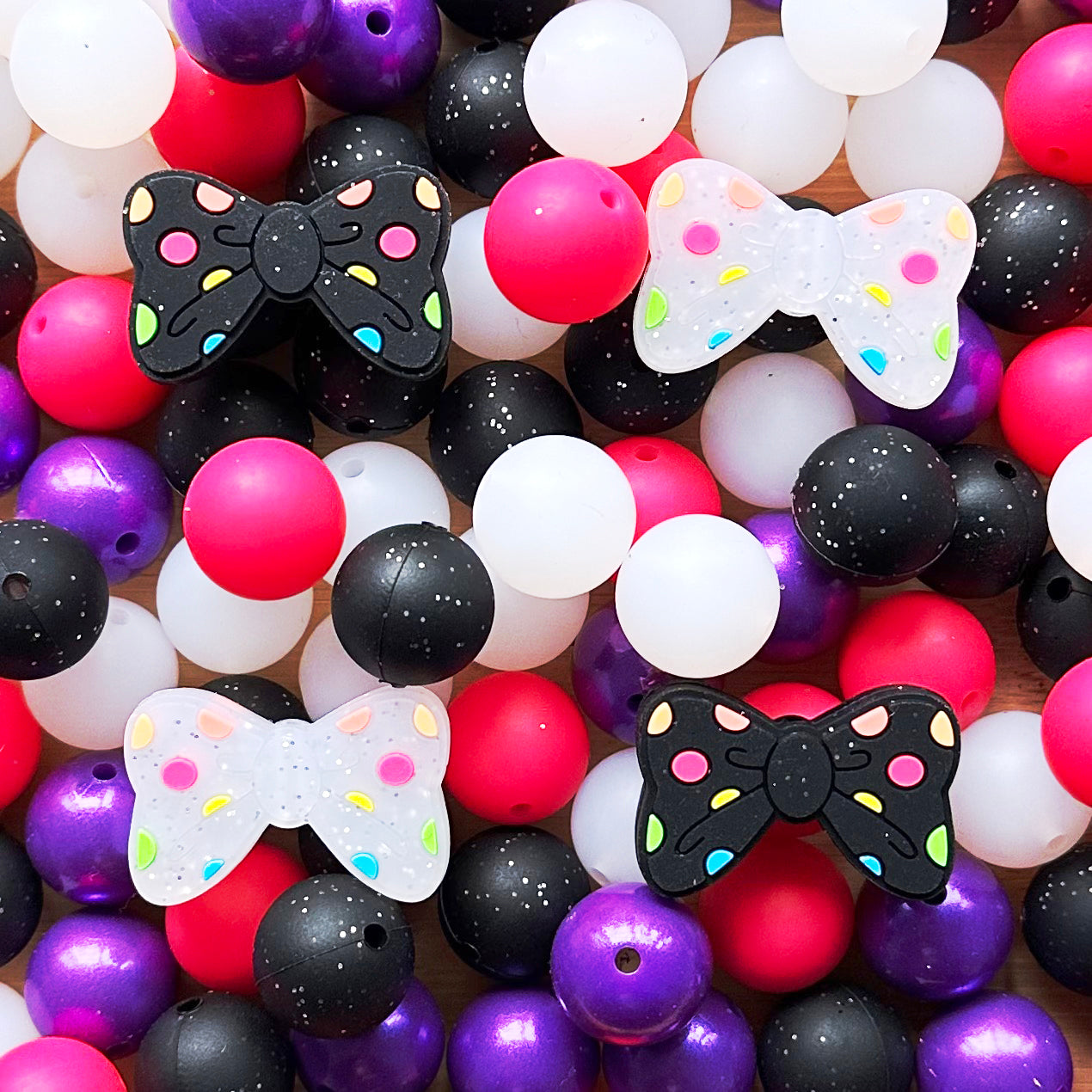 Assorted Bowknot Glitter Silicone Beads Pack